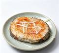 Savory Pan-Seared Fish Steak with Spices and Garnish